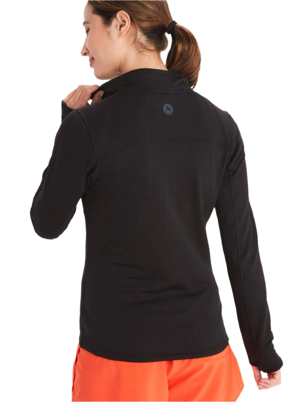 Woman wearing Marmot Preon Jacket - Women's Fleece Midlayer in black, showcasing the breathable grid fleece ideal for UAE climates.