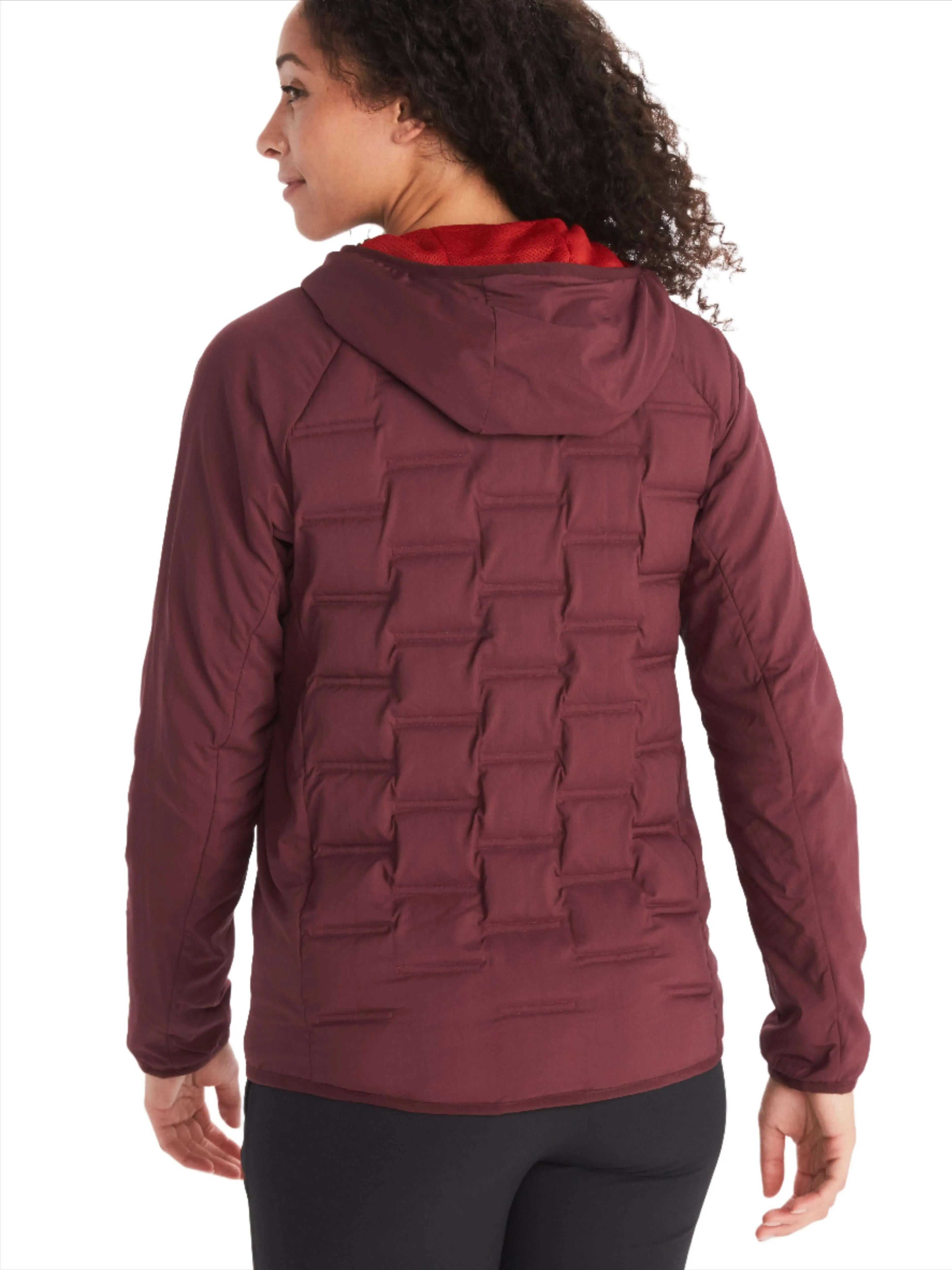 Woman wearing Marmot Warmcube Women's Active HB Jacket in maroon, showcasing the 3D WarmCube construction for optimal warmth.