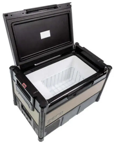 ARB Zero Portable Fridge Freezer Single Zone - 60L mounted securely in the cargo area of an overlanding 4x4 vehicle.