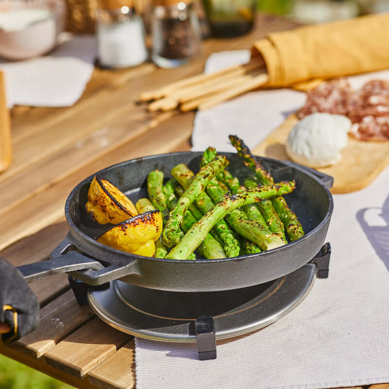 Ooni Cast Iron Skillet Pan packed with roasted vegetables for a desert camping trip