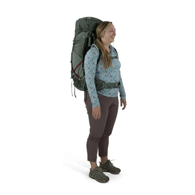 Woman wearing the Osprey Aura AG LT 50 backpack, showcasing lightweight and ventilated design for technical backpackers.