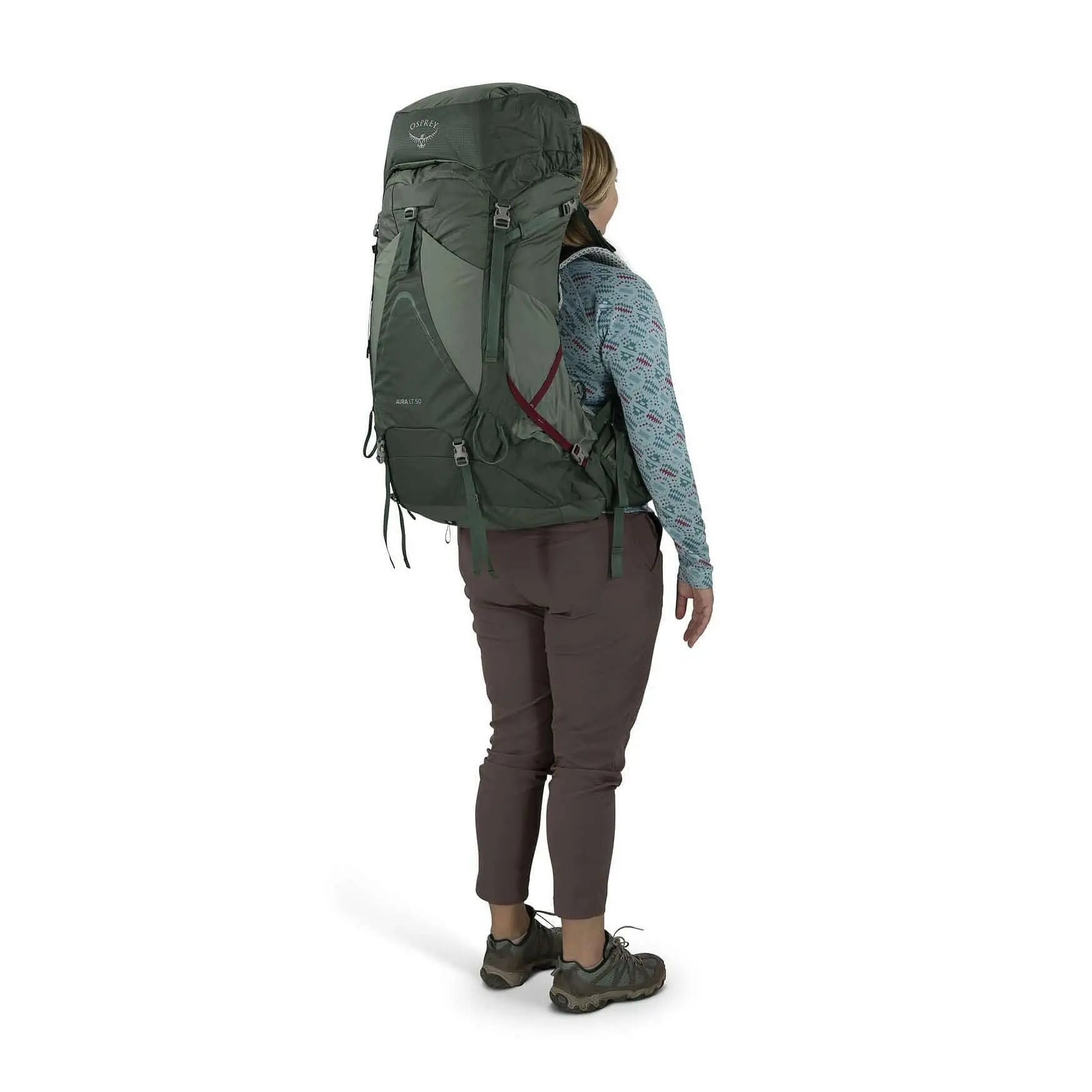 Osprey Aura AG LT 50 - Women backpack showcasing lightweight, ventilated design on woman's back, ideal for technical backpackers.