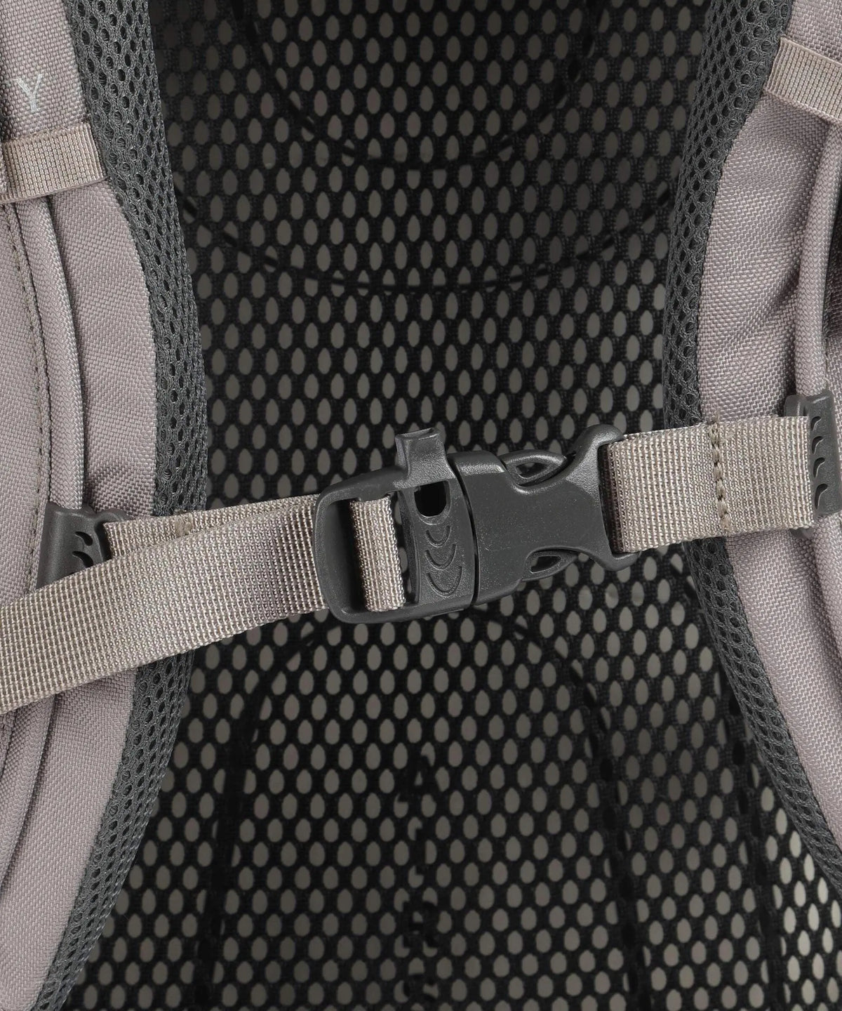 Close-up of adjustable strap on Osprey Renn 65 - Women backpack, featuring women's-specific fit and certified bluesign® product.