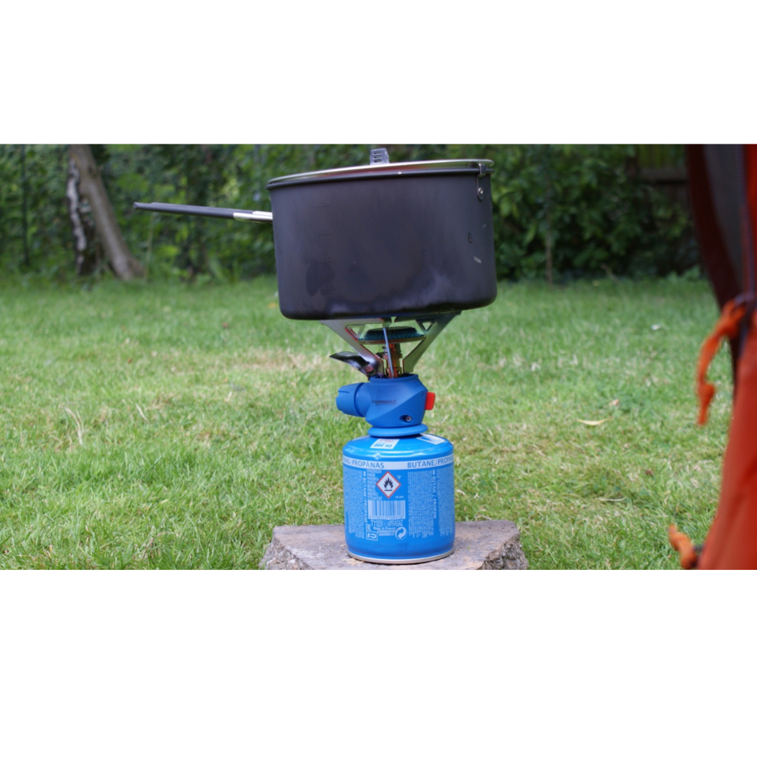 Campingaz C206 Cartridge Gas Canister fueling outdoor cooking stove in garden