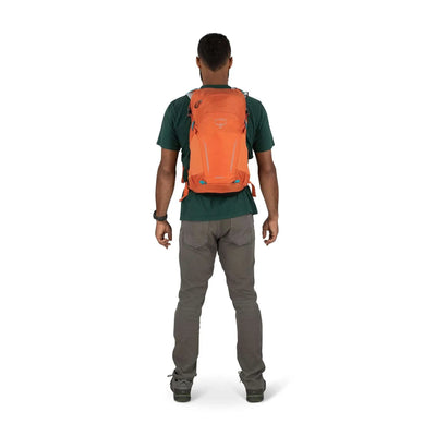Man wearing Osprey Hikelite 18 daypack with AirSpeed ventilation, showcasing the lightweight and streamlined design ideal for hiking.