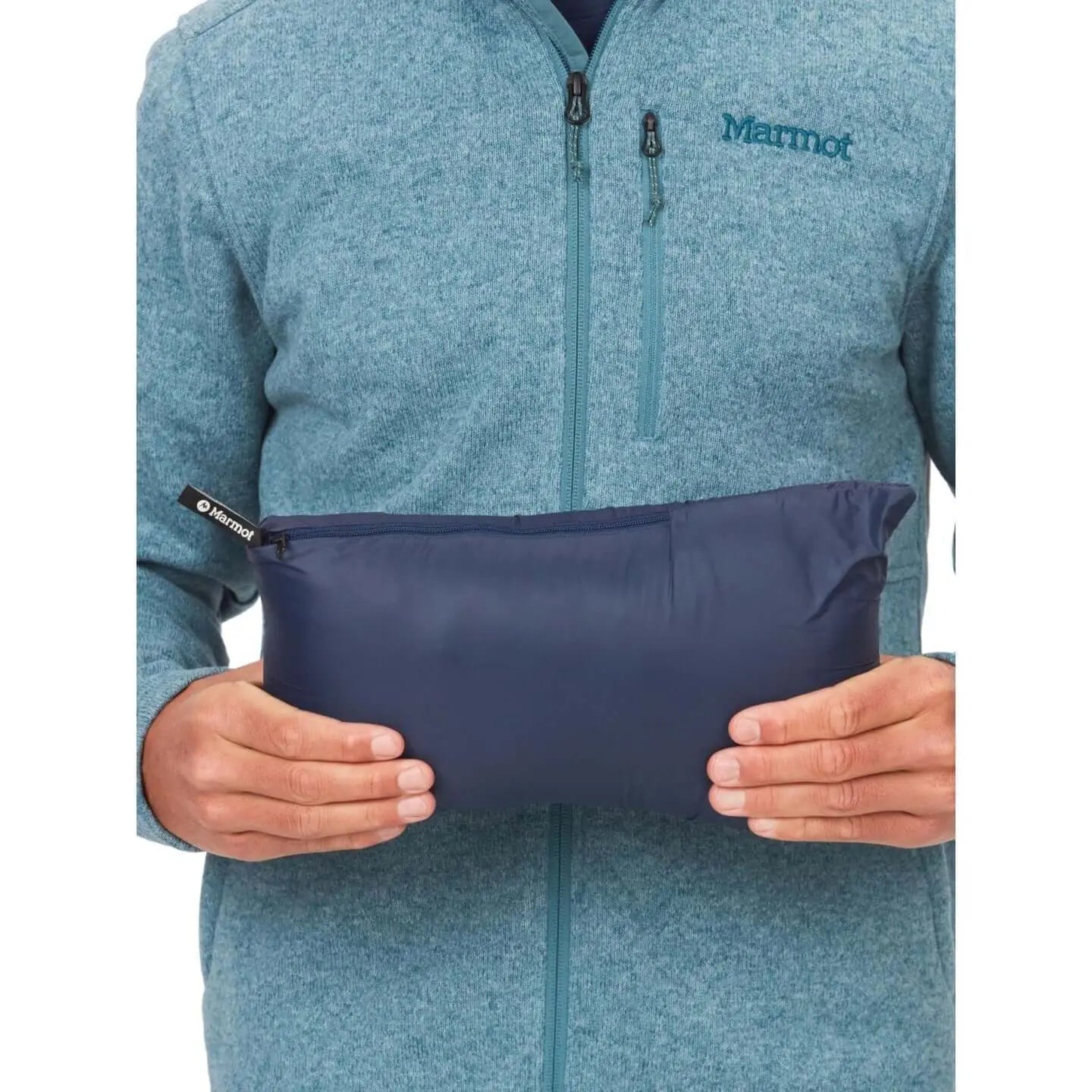 Compact Marmot Highlander Jacket - Men packed, ideal for UAE adventures, shown in blue, highlighting lightweight travel convenience.
