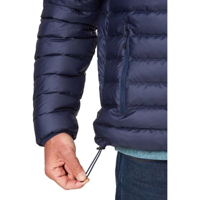 Close-up of Marmot Highlander Jacket - Men with adjustable drawcord, showcasing navy down insulation and side pocket detail.