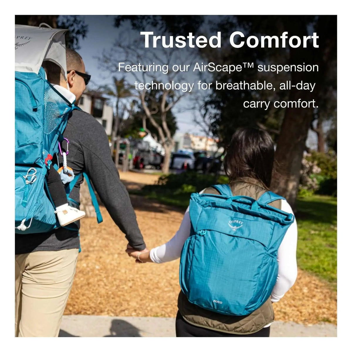 Couple walking with Osprey Poco Changing Tote featuring AirScape™ technology for comfort. Ideal for parenting on the go.