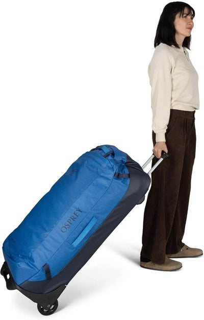 Transporter Wheeled Duffel 120 by Osprey, featuring a robust, water-resistant design and oversized wheels for easy transport.