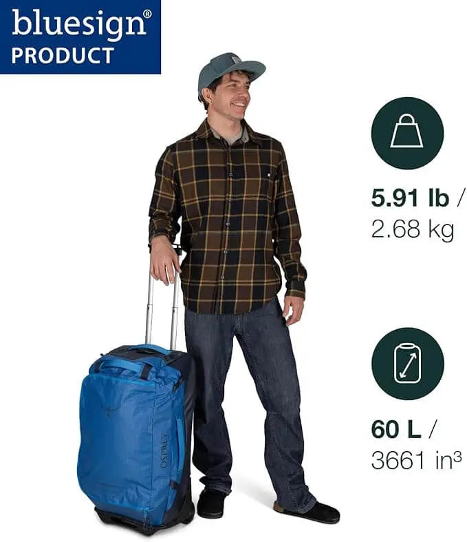 Man with a Transporter Wheeled Duffel 60 by Osprey, showcasing durable design and bluesign® product certification.