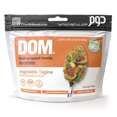 Dine Out Meals Vegetable Tagine with Bulgur Wheat packaging, a Moroccan-inspired dish with chickpeas, zucchini, and more, ready to eat.