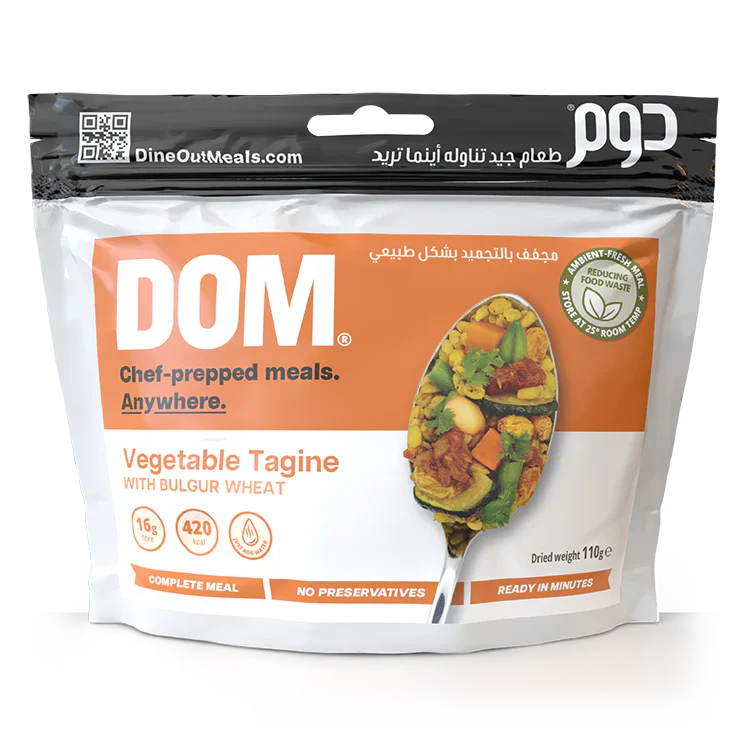Dine Out Meals Vegetable Tagine with Bulgur Wheat packaging, a Moroccan-inspired dish with chickpeas, zucchini, and more, ready to eat.