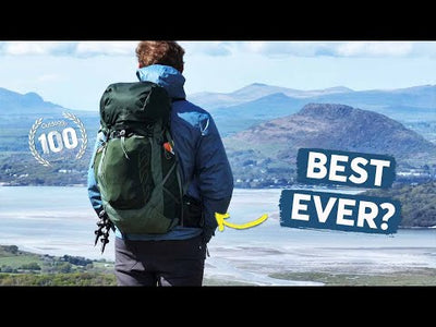 Man with Talon 33 Extended Fit - Men backpack overlooking landscape, showcasing its best features for outdoor adventures.