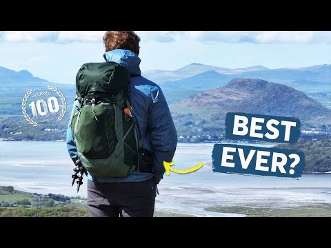Man with Talon 33 Extended Fit - Men backpack overlooking landscape, showcasing its best features for outdoor adventures.
