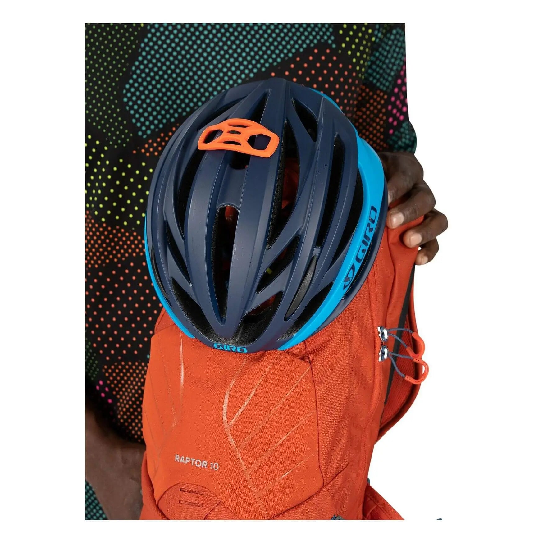 Osprey Raptor 10 mountain biking pack with helmet, featuring Hydraulics reservoir for ultimate performance.