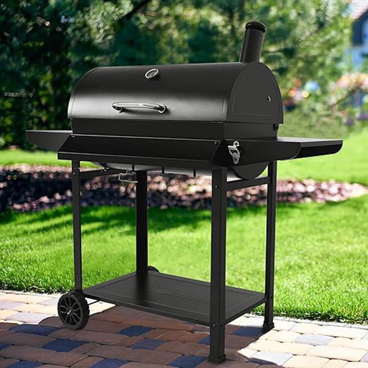 Royal Gourmet 28-Inch Barrel Charcoal Grill with Front Basket in UAE Backyard