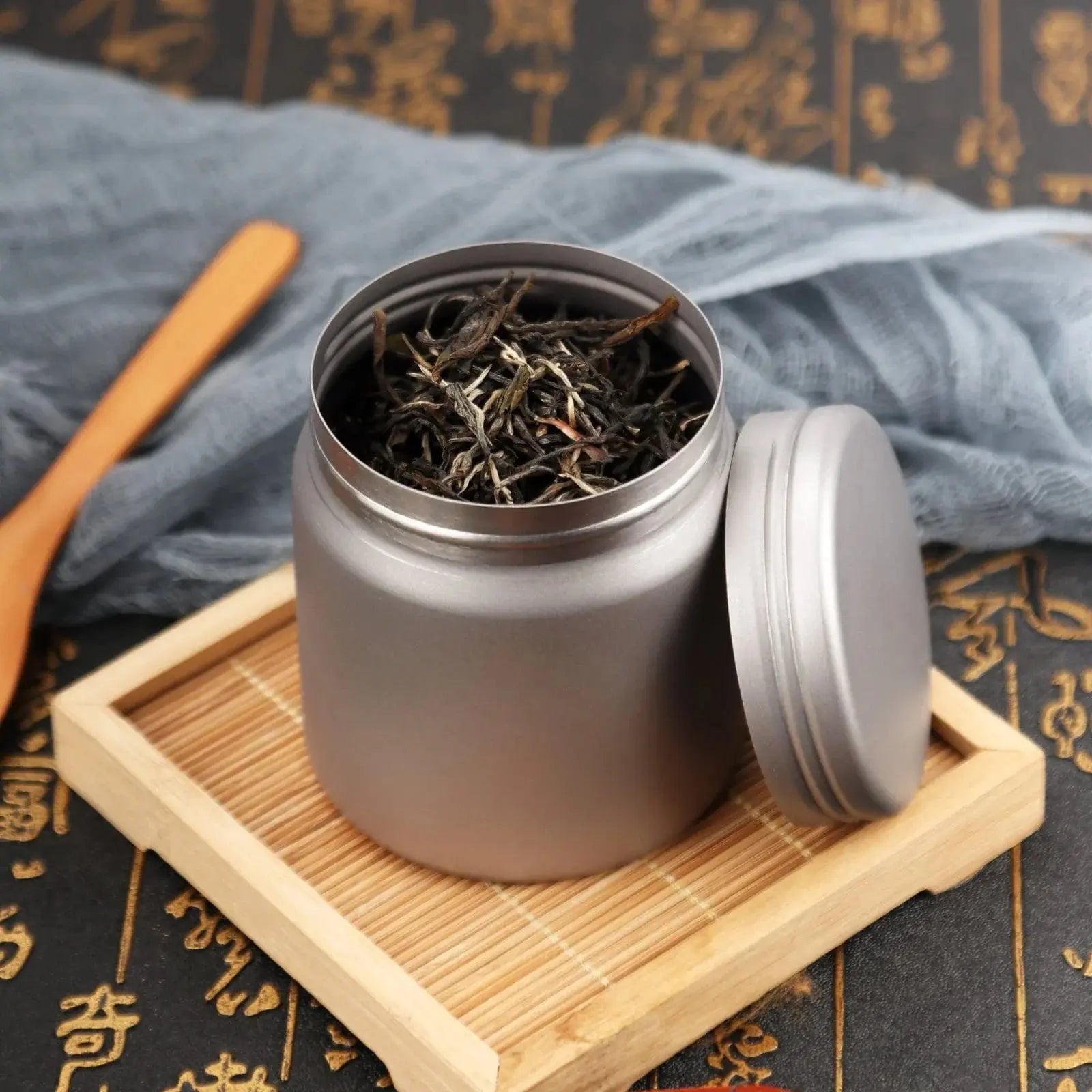 SilverAnt Titanium Container holding coffee beans outdoors