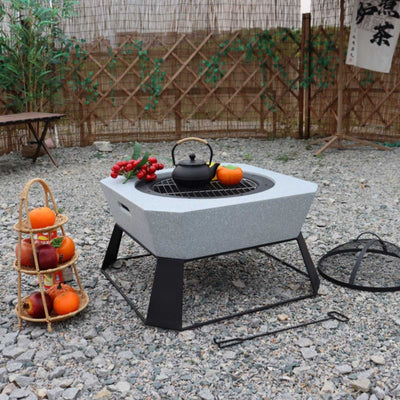 MGO Square Fire Pit burning logs safely at a desert campsite